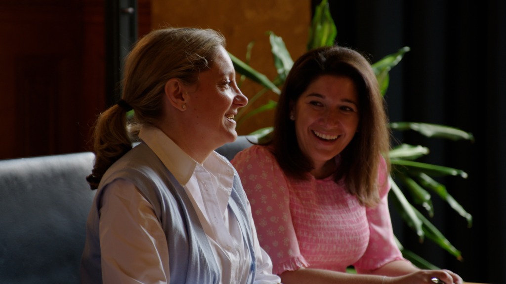 Schonfeld team members collaborating in the office